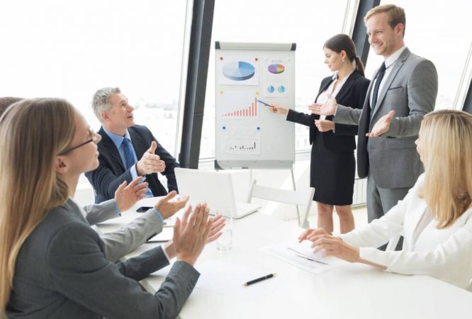 Business,People,Team,At,Presentation,Working,With,Charts,And,Diargams